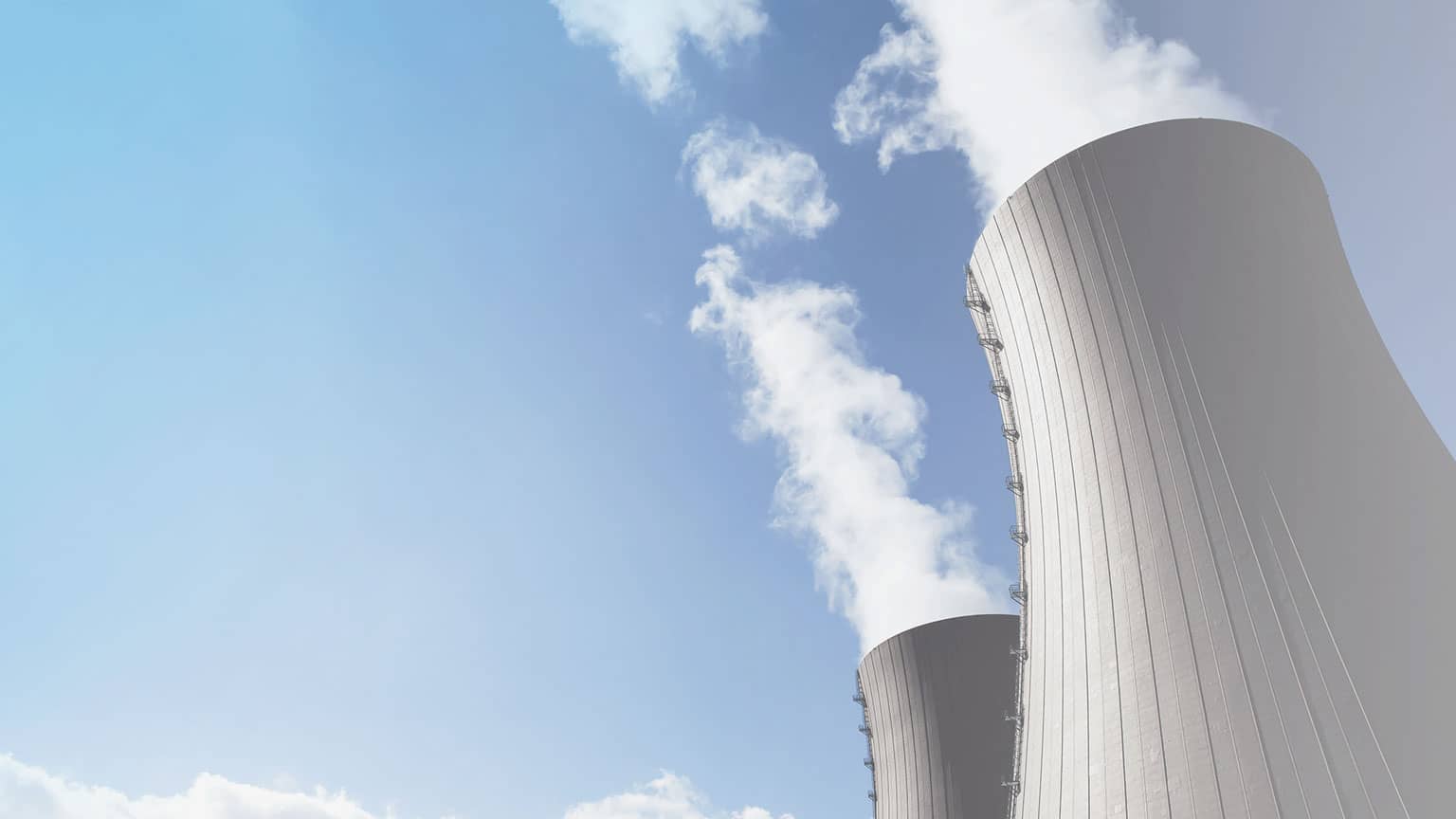 Power plant in front of clear blue skies