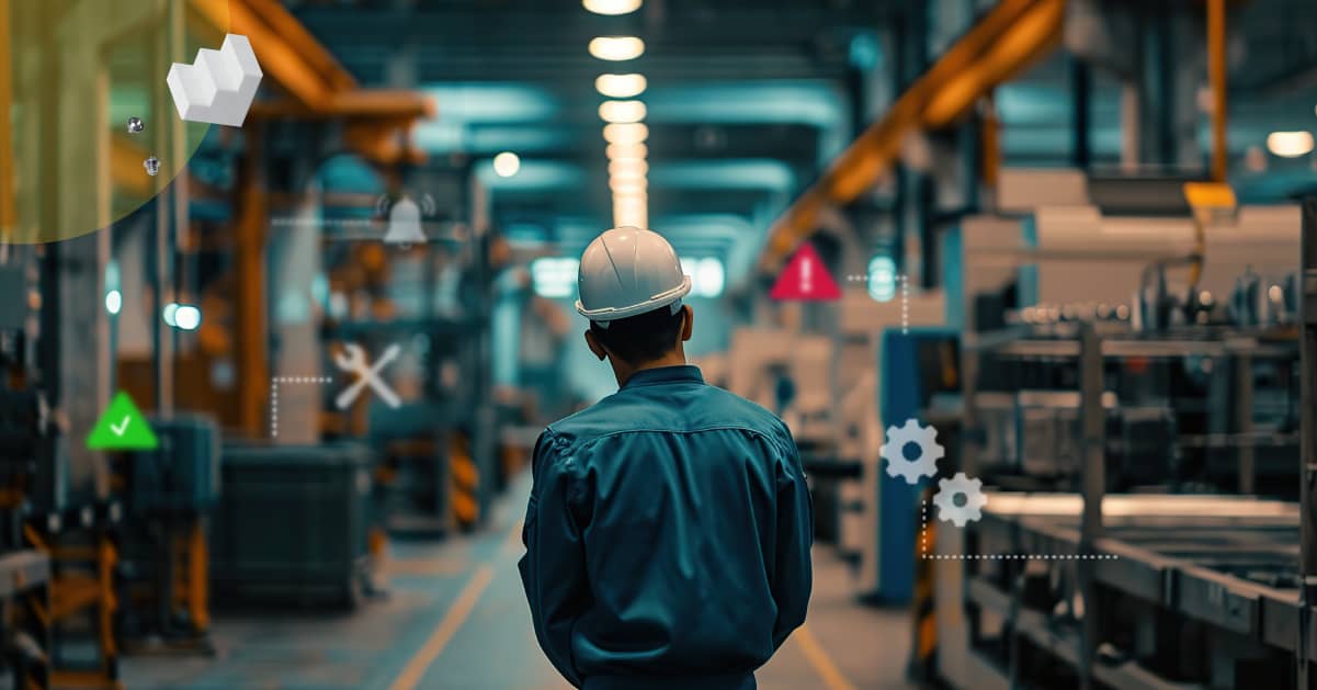 Backshot of a maintenance worker in a warehouse