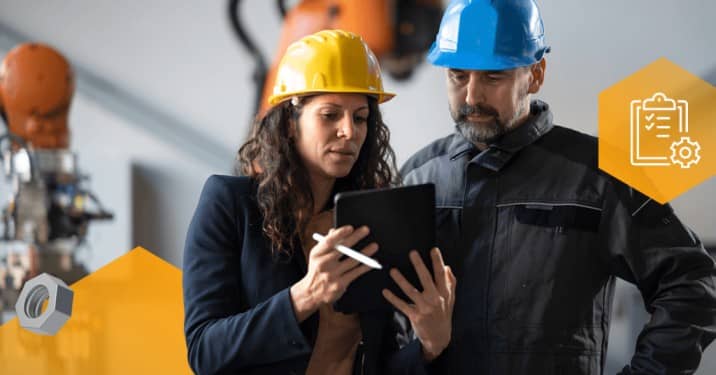 2 maintenance workers looking at ipad